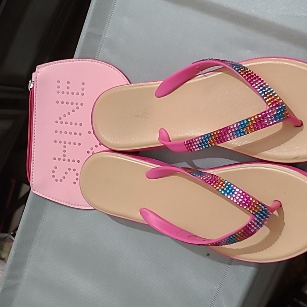 Hot pink bedazzled flip flops